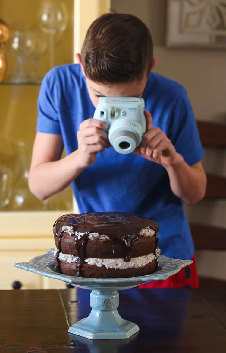 My Son Taking a Picture of Our Cookies and Cream Cake with His Polaroid Camera