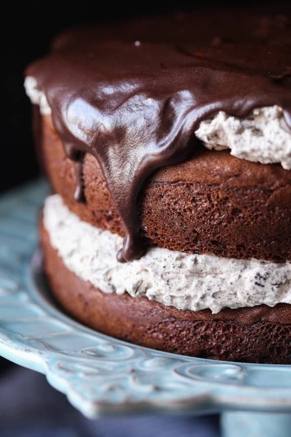 A Chocolate Cake Layered with Oreo Frosting and Topped with Chocolate Ganache