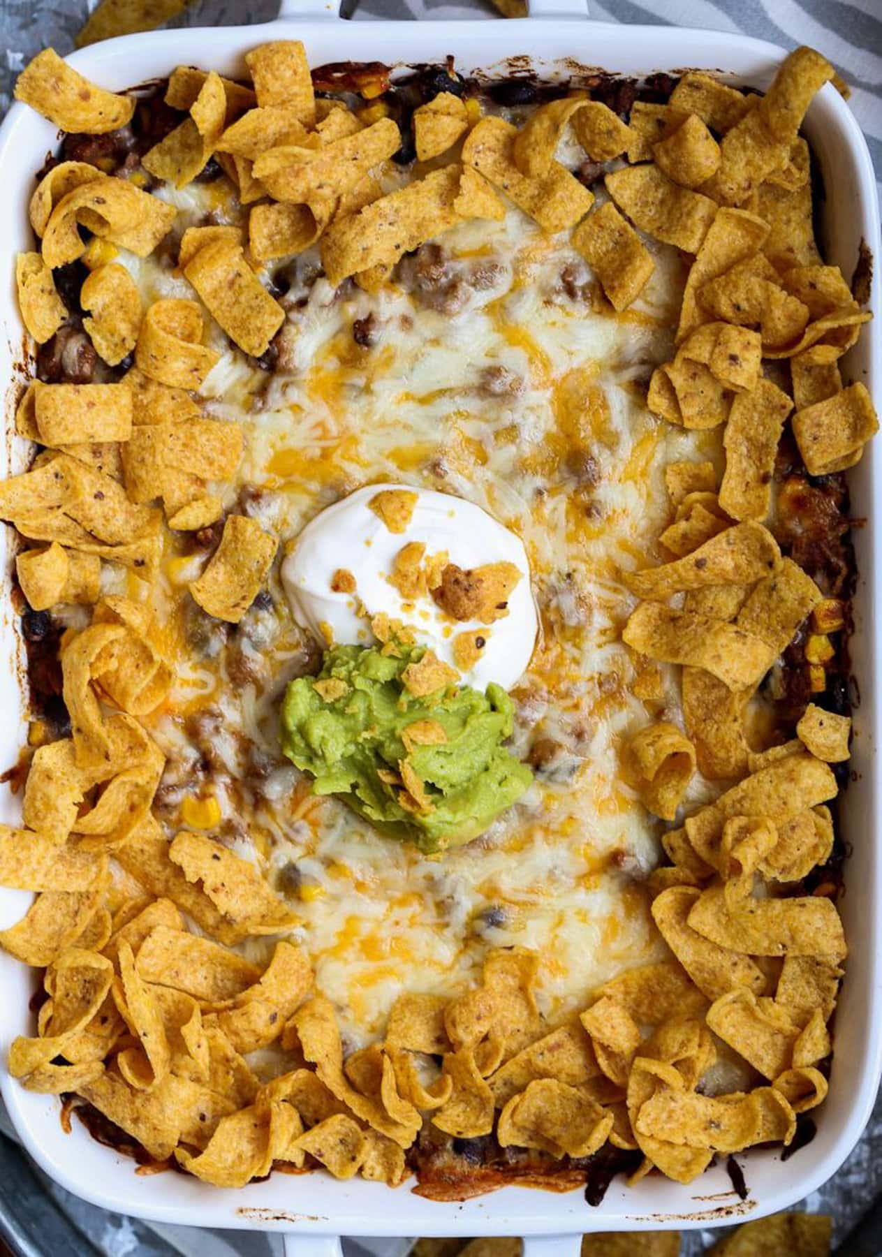 Frito casserole served out of a 9x13 pan