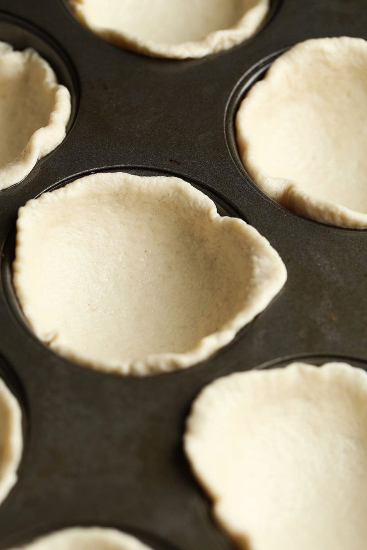 Canned biscuit in a muffin tin