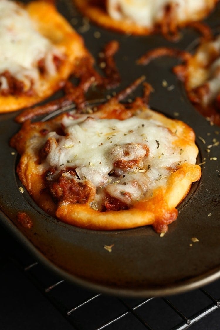 Pizza muffin right out of the oven in a muffin tin