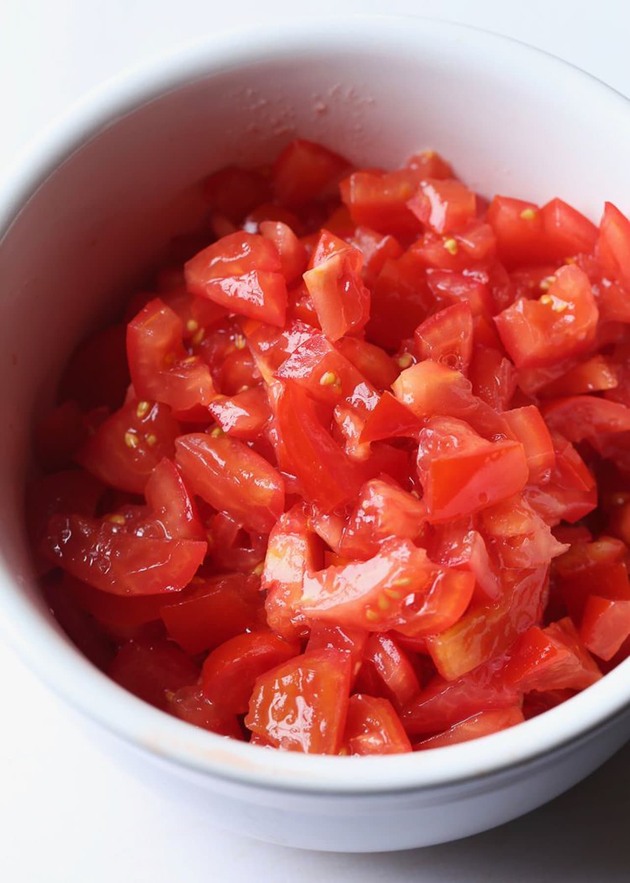 Tomatoes diced in a bowl