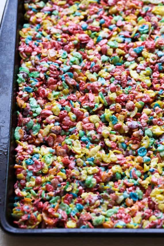 Fruity Pebble mixture pressed into a pan