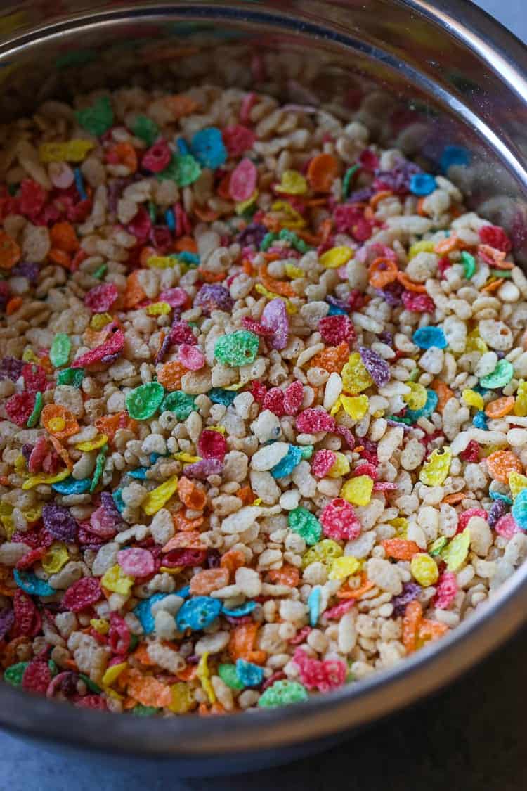 My most favorite krispie treat recipe includes the perfect amount of marshmallow and fruity pebbles! This are my most requested sweet treat at parties!