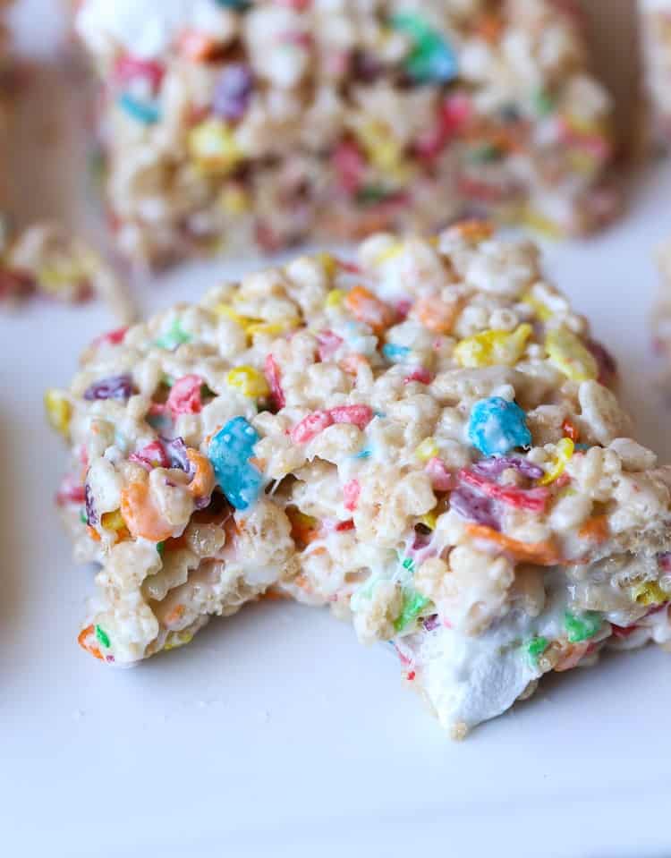 My most favorite krispie treat recipe includes the perfect amount of marshmallow and fruity pebbles! This are my most requested sweet treat at parties!