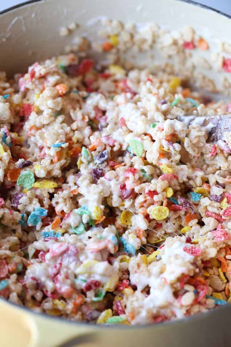 My most favorite krispie treat recipe includes the perfect amount of marshmallow and fruity pebbles! This are my most requested sweet treat at parties!