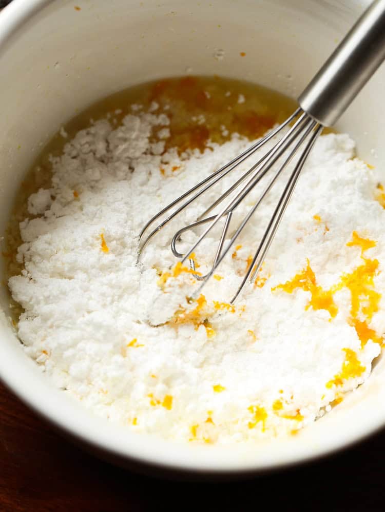 A Whisk Combining the Glaze Ingredients in a Mixing Bowl