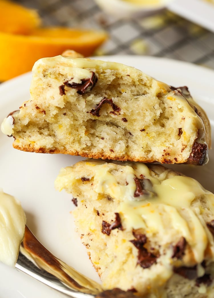 An Orange Chocolate Chip Scone Cut in Half to Reveal the Fluffy Interior