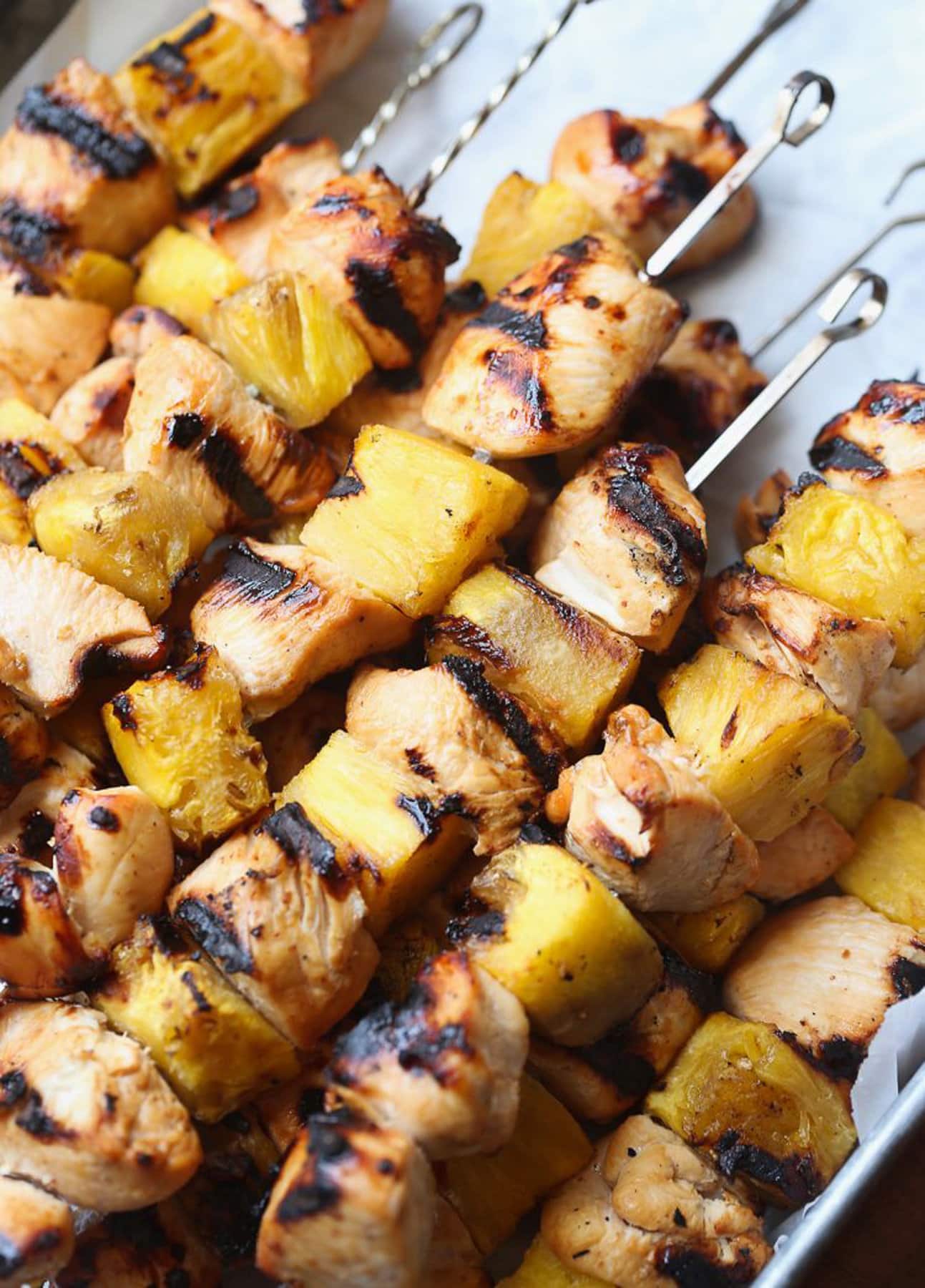 Pineapple Chicken Skewers served to eat