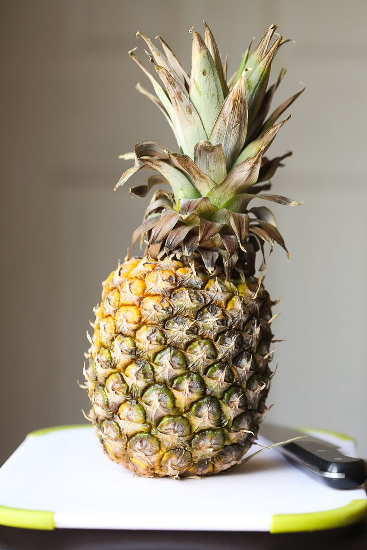 Pineapple on a cutting board