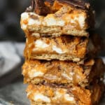 Butterfinger Caramel Bars stacked on top of each other