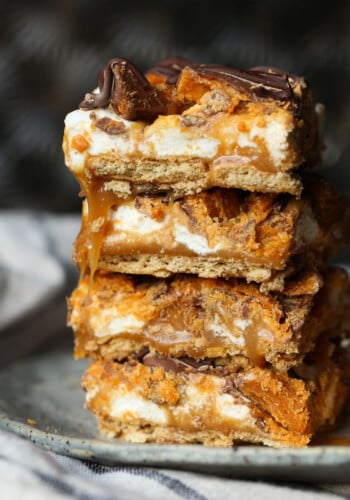Butterfinger Caramel Bars stacked on top of each other