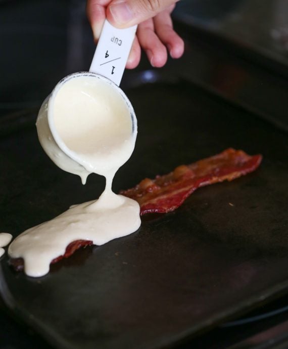 Pancake Bacon Dippers! A soft pancake surrounds a crispy piece of bacon that you can dip right in maple syrup!