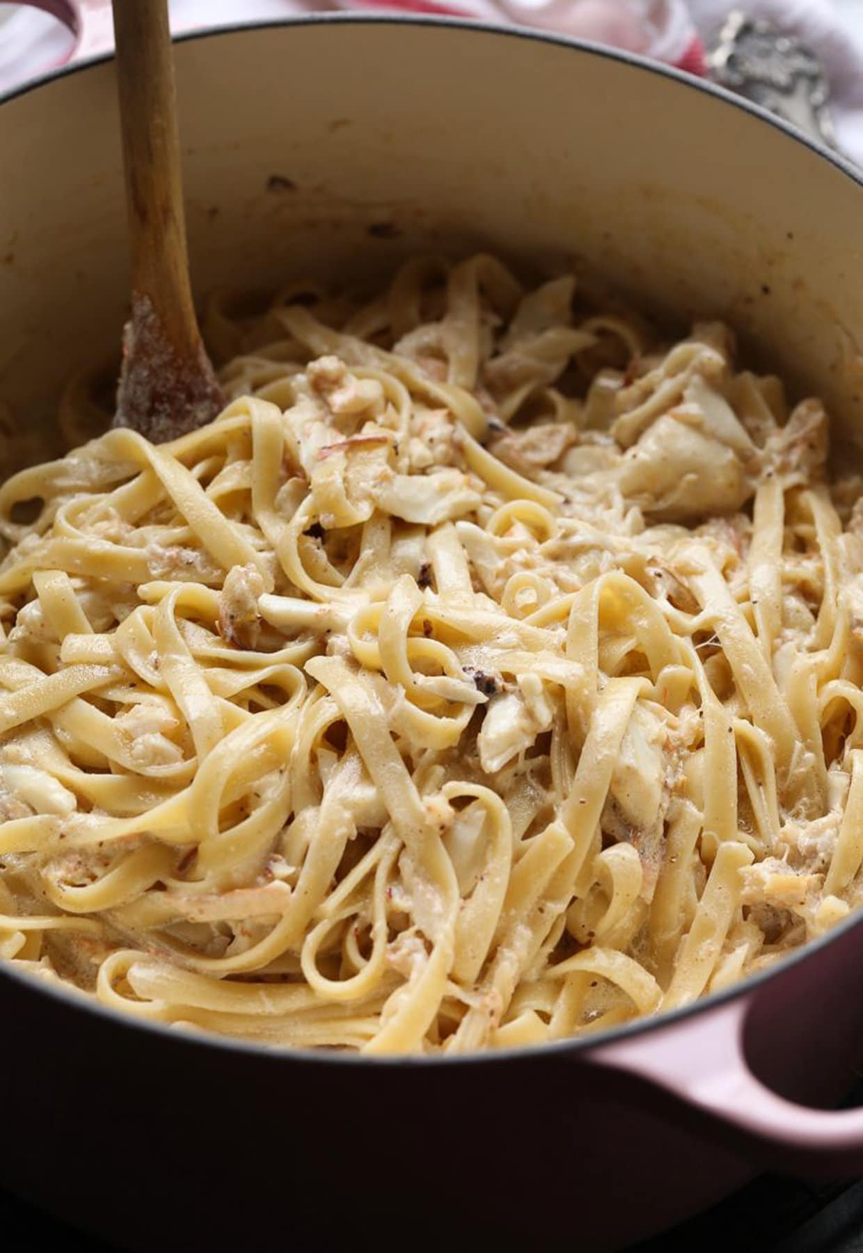 Crab Alfredo being served to eat