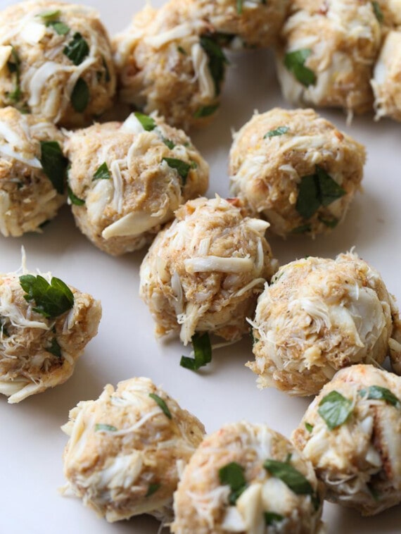 These crispy crab balls are an easy appetizer! They're made with juicy lump crab and Old Bay, served with spicy tartar sauce for dipping. formed crab balls before on a countertop
