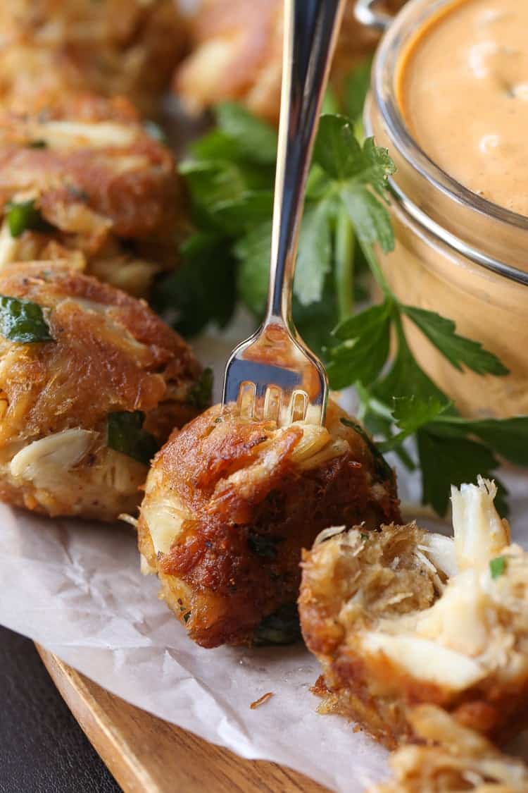 Crispy Crab Balls appetizer with a fork