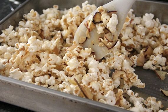 Image of Caramel Apple Popcorn Being Mixed with a Spoon