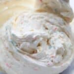 Marshmallow frosting with colorful sprinkles mixed in.