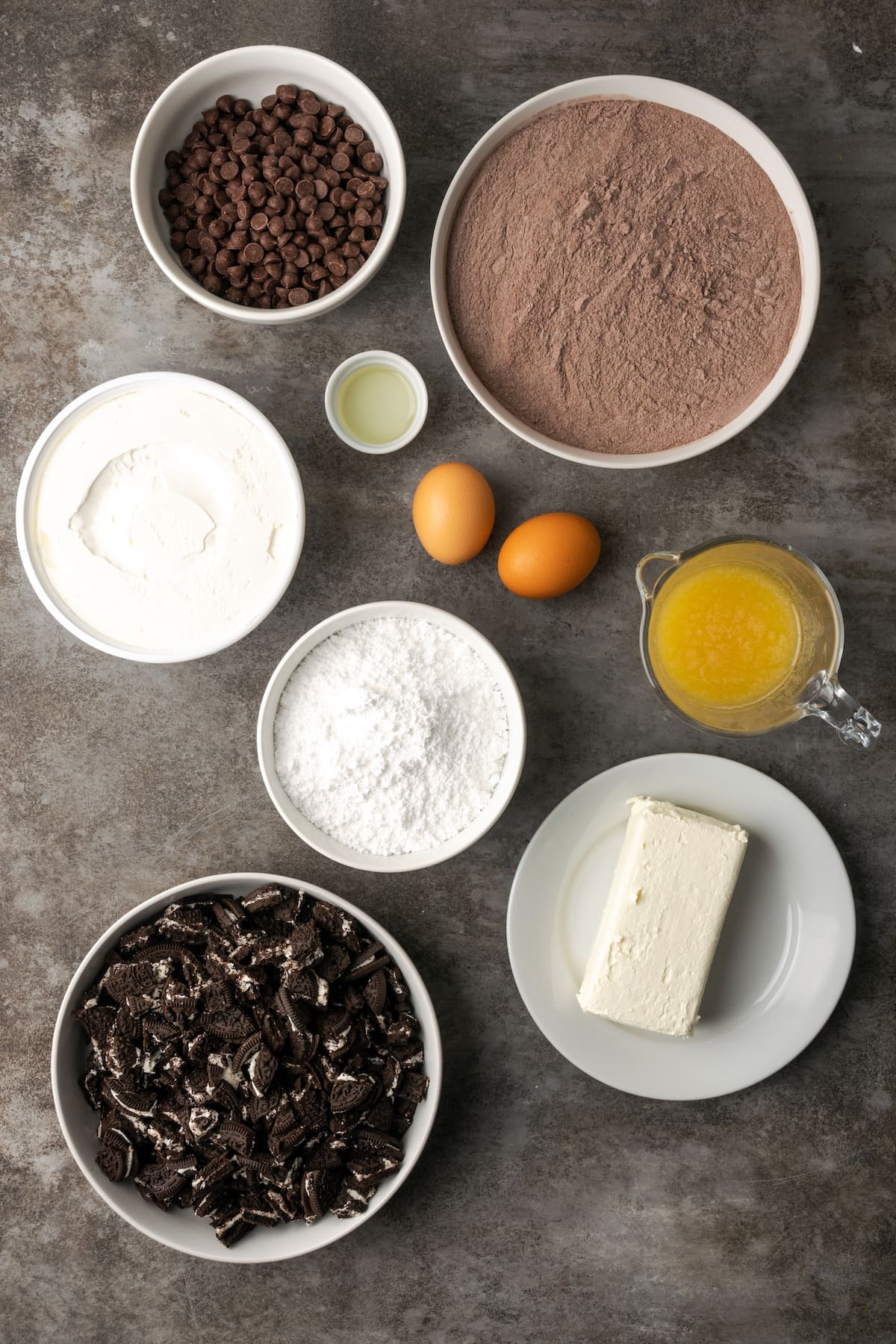 The ingredients for homemade Oreo brownies with cream cheese frosting.