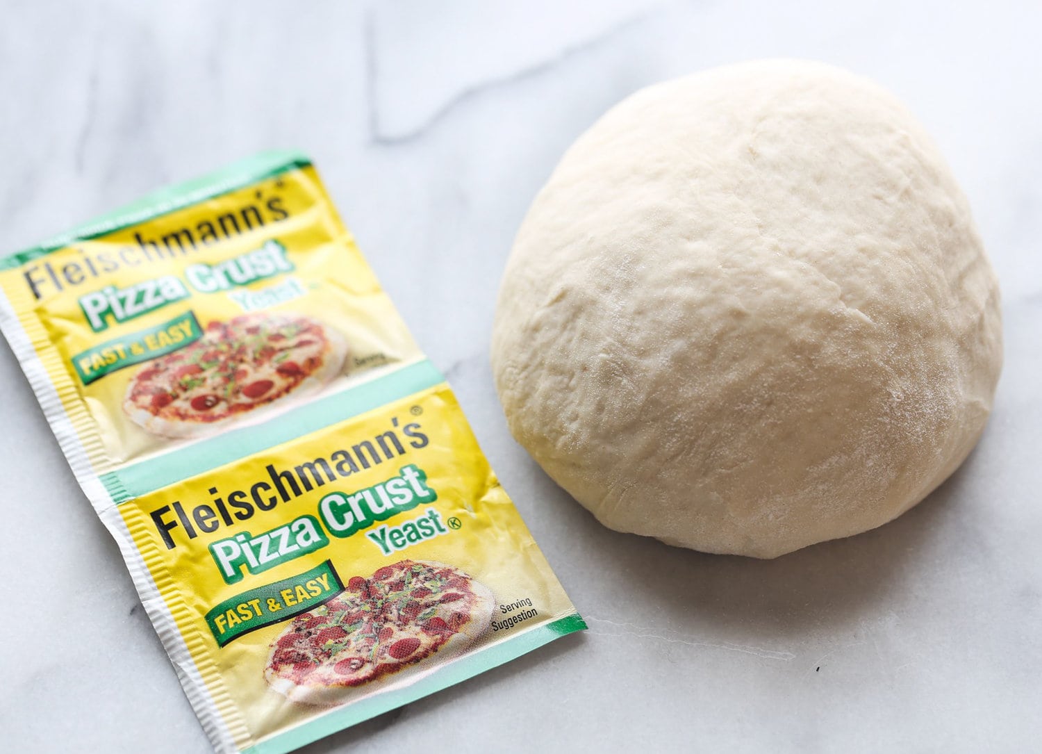 Pizza dough and pizza crust yeast