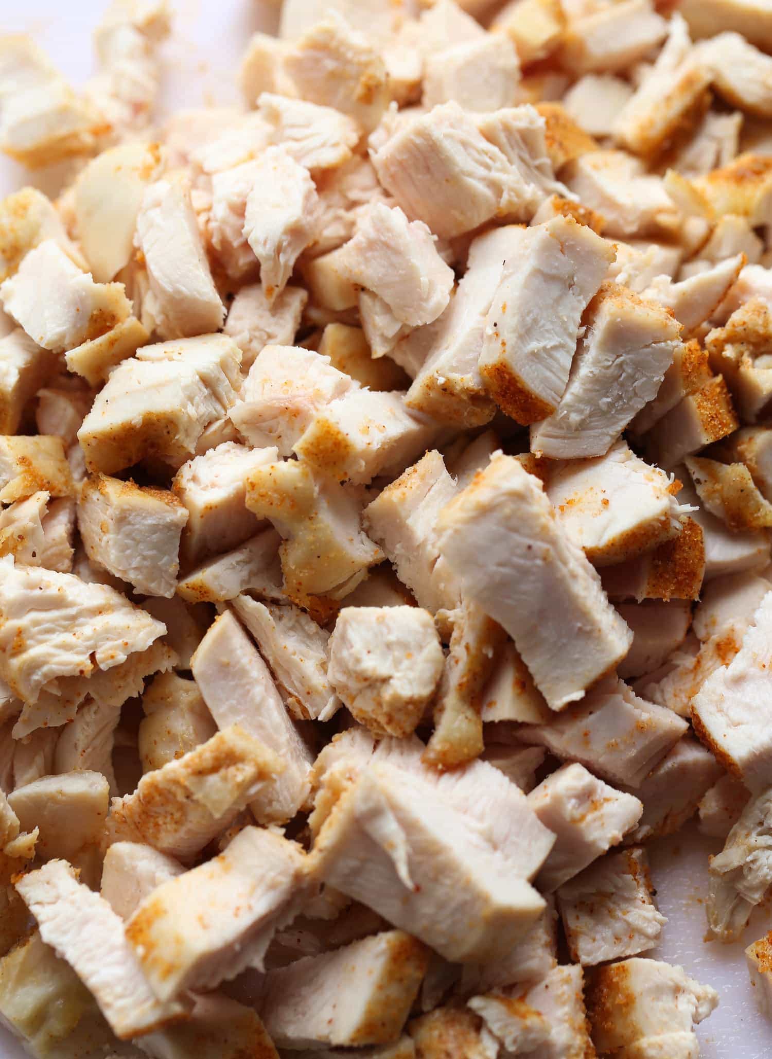 cooked chicken, cut into cubes in a glass bowl