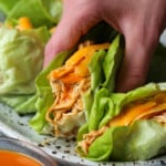Lettuce wrapped buffalo chicken topped with cheese