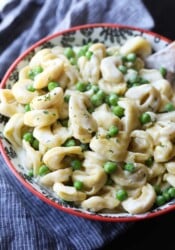 15 minute Cream Cheese Alfredo Sauce served with pasta and peas