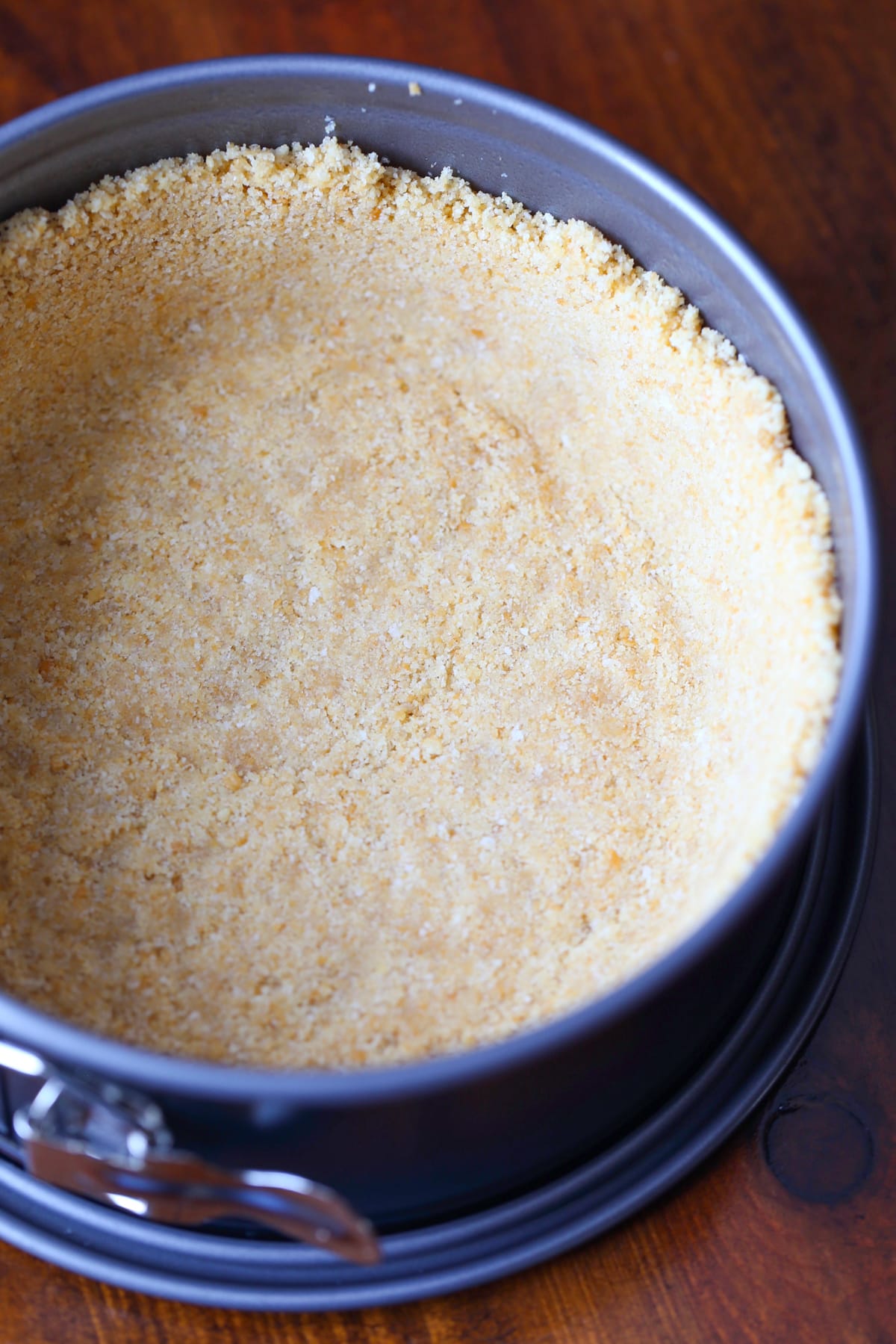 Ritz cracker crust pressed into the bottom of a springform pan.