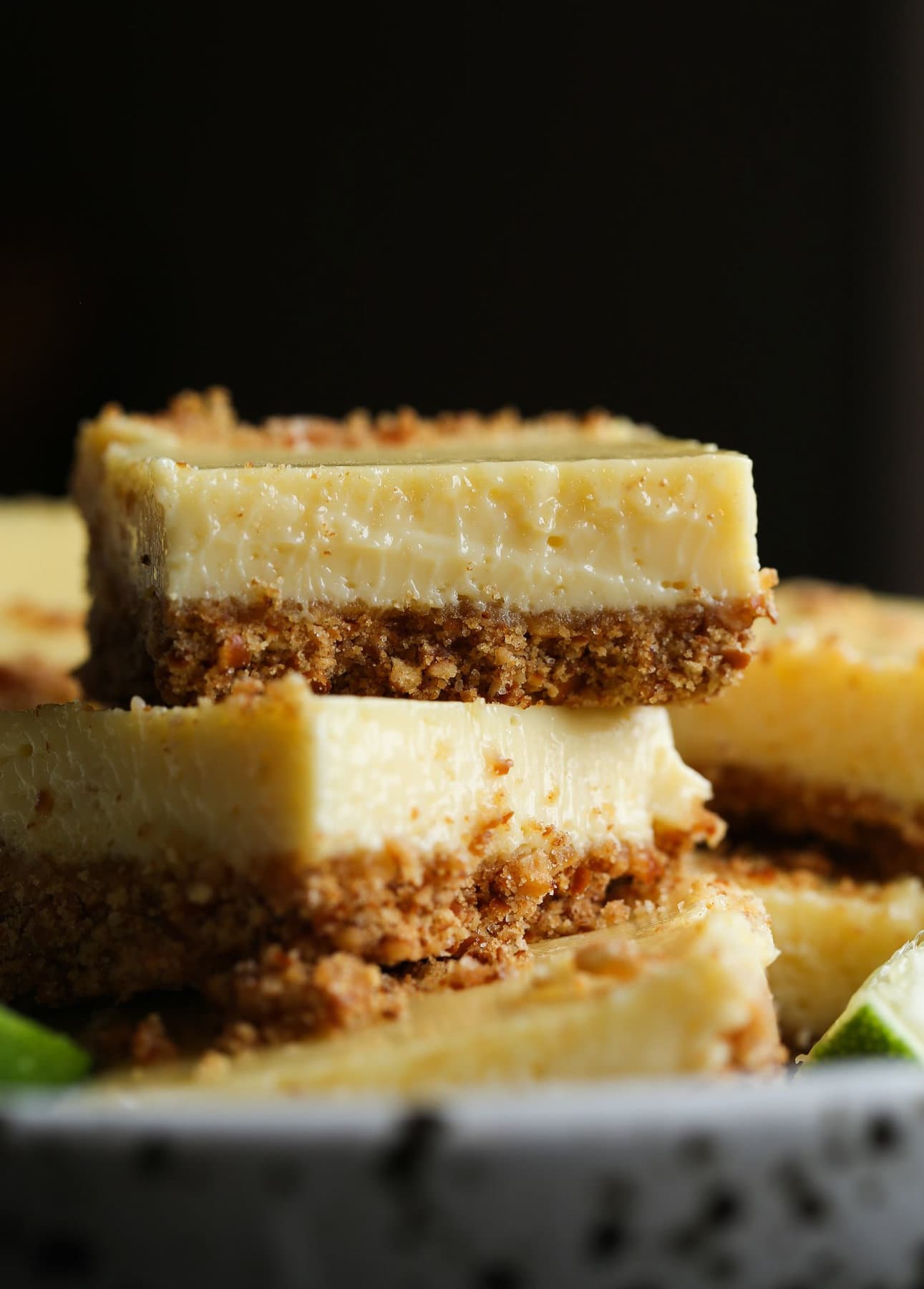 Pretzel Crusted Key Lime Bars stacked on top of each other