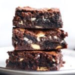 Bombshell Oreo Brownies stacked on a plate
