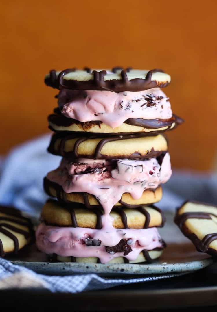 Stacked fudge stripe cookie ice cream sandwiches.