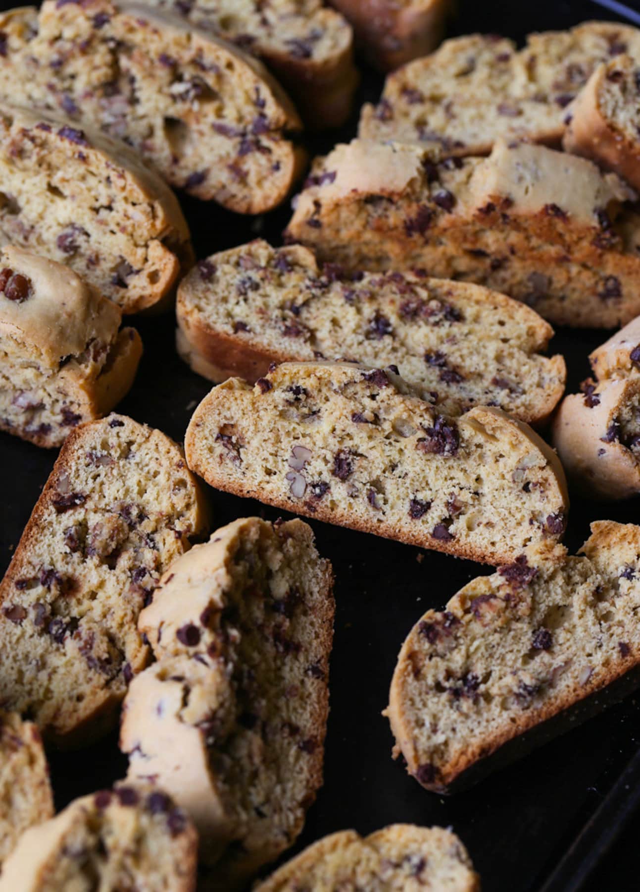 A stack of Cake Mix Biscotti with chocolate chips on a tray