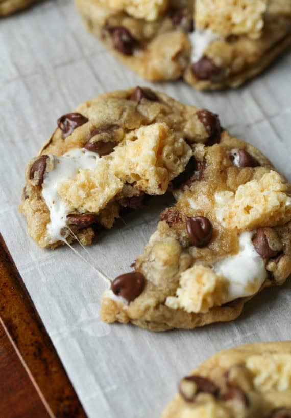 rice krispie treats chocolate chip cookie in half on a baking sheet