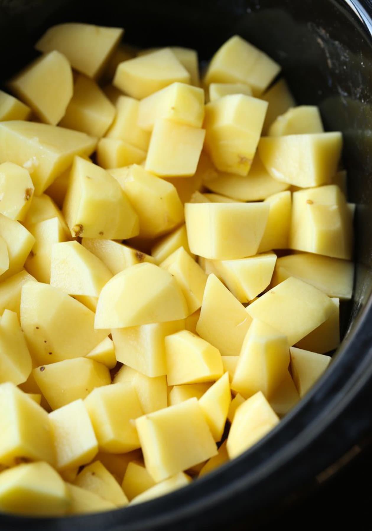 Chopped potatoes in a crockpot