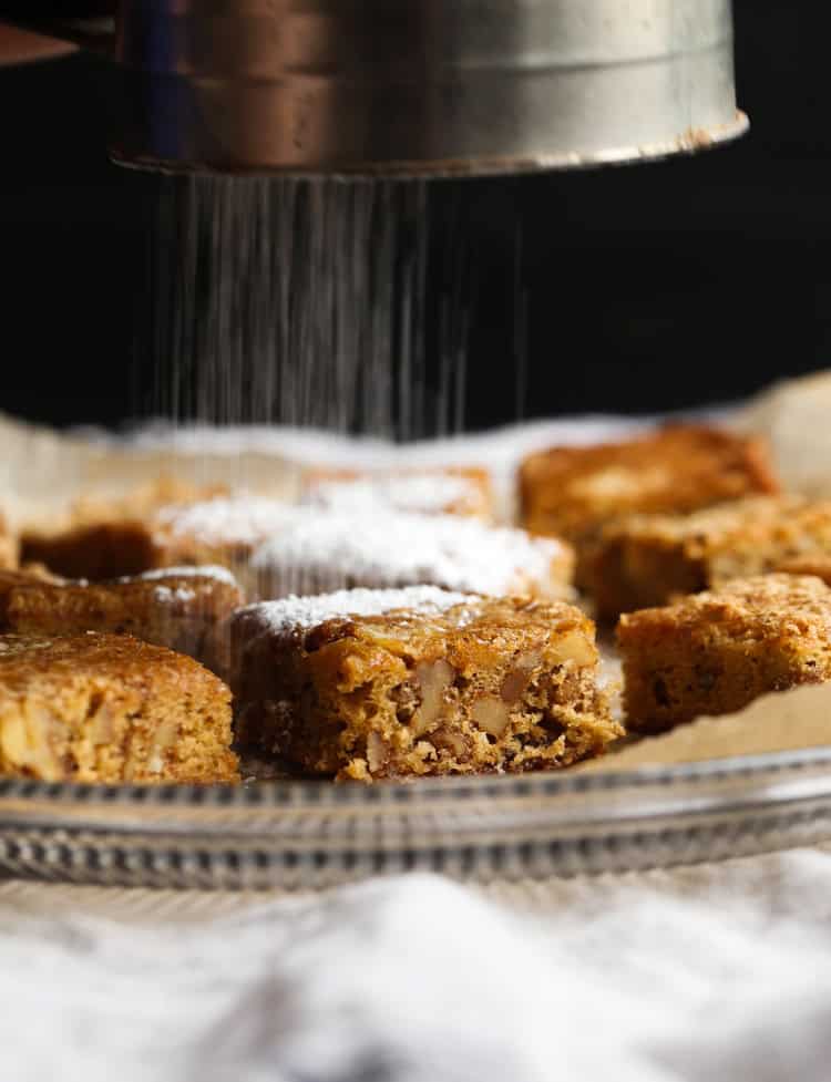 Classic Chewy Noels are a brown sugar cookie bars topped with powdered sugar