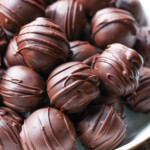 peanut butter balls stacked in a serving bowl