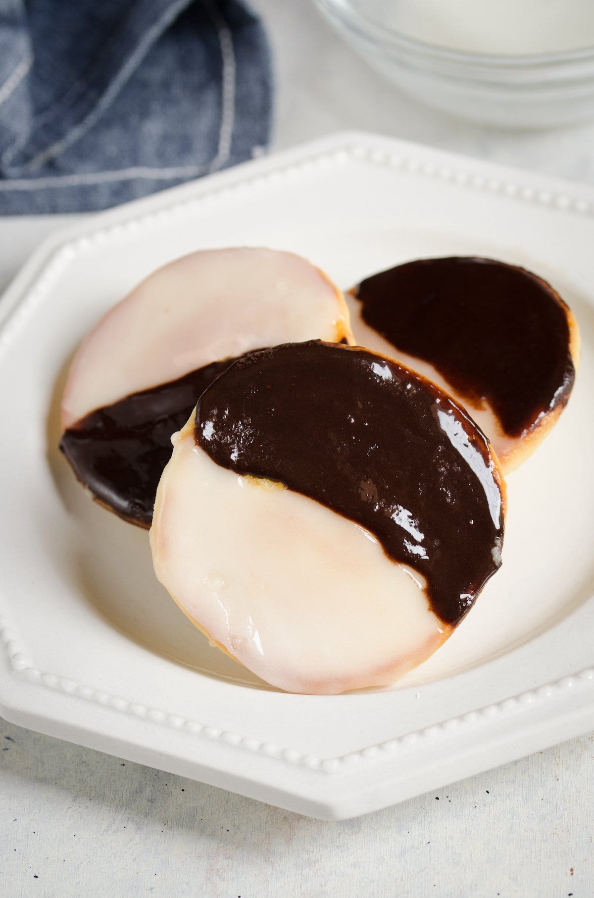 Black and white cookies on a plate.
