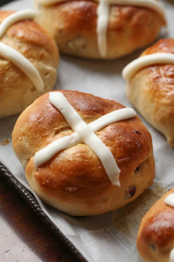 Hot Cross Buns are drizzled with sweet icing in the shape of a cross