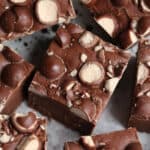 malt balls pressed into the top of fudge