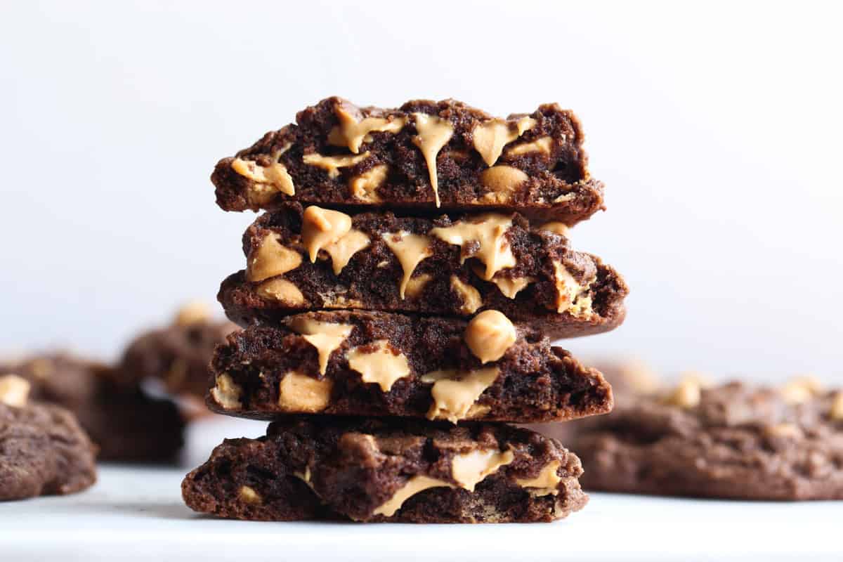 Chocolate cookies stacked with melty peanut butter chips