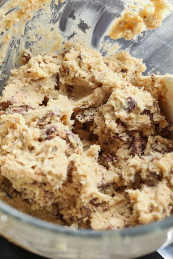 Kit Kat cookie dough in a glass bowl from the stand mixer