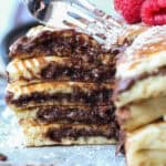 Nutella Stuffed Pancakes are an over the top pancake recipe filled with creamy Nutella