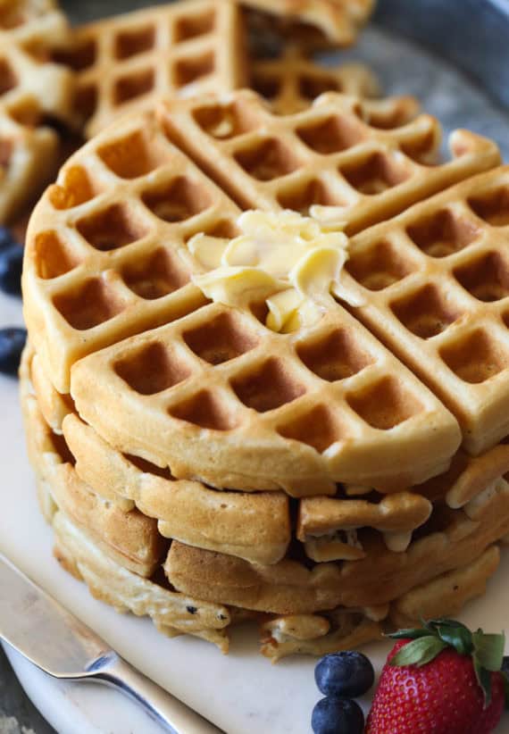 This Classic Buttermilk Waffle Recipe is golden brown and topped with butter