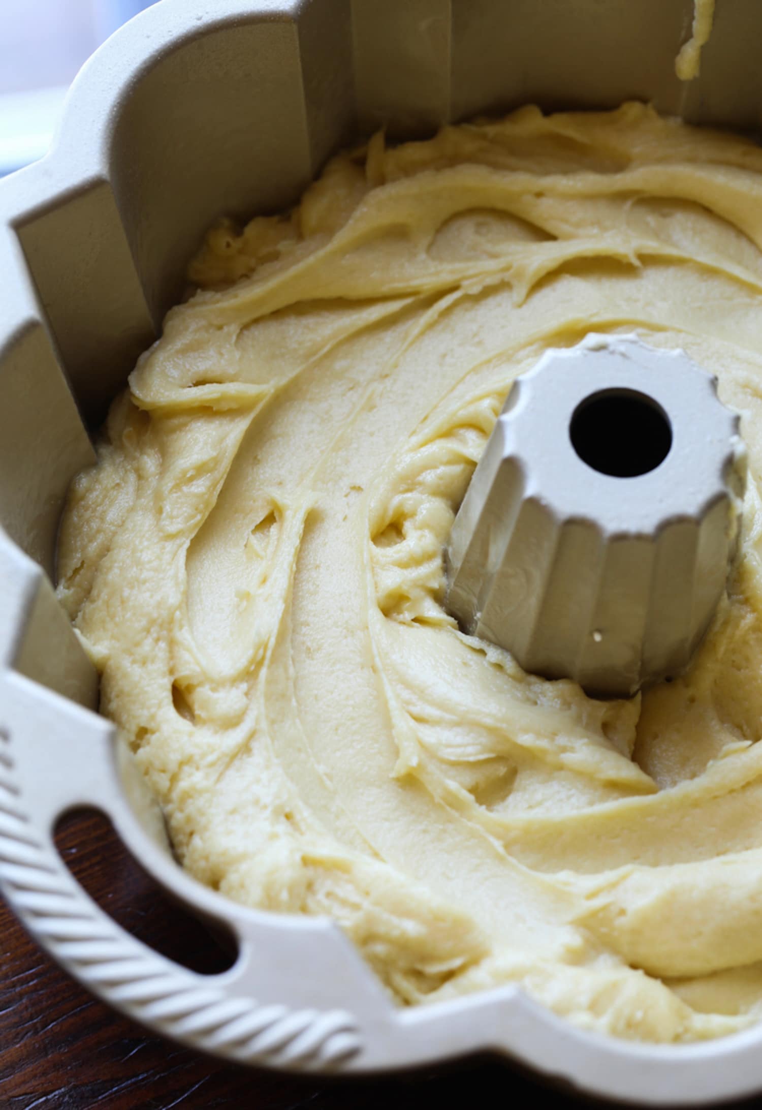 pound cake batter in a bundt pan