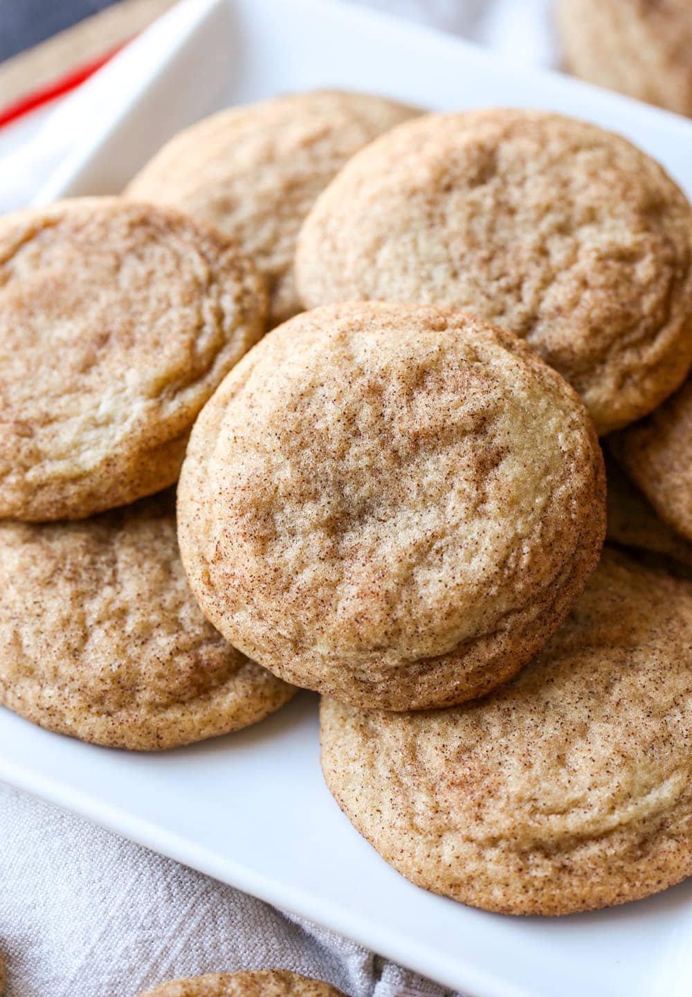 Plate of soft and chewy snickerdoodle cookies.