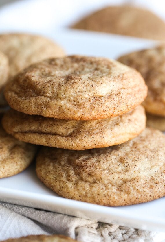 SNickerdoodle Cookies stacked on a plate