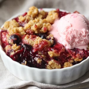 Mixed Berry Crisp topped with ice cream