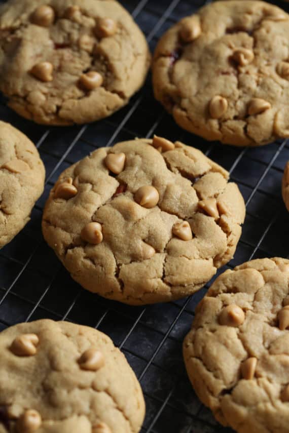 Peanut Butter and Jelly Cookies are stuffed with peanut butter and jelly with a crackly top