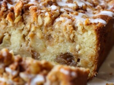 Apple Fritter Bread is loaded with apples and drizzled with icing
