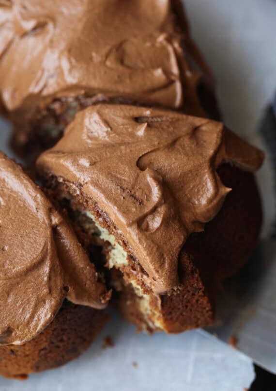 Marble Cake Recipe baked in a bundt cake topped with chocolate frosting